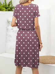 Drawstring waist midi dress in Moonlit Mauve with white polka dots, short sleeves, and side slits.