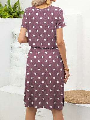 Drawstring waist midi dress in Moonlit Mauve with white polka dots, short sleeves, and side slits.