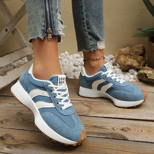 Sky blue and white lace up round toe sneakers with a chunky sole