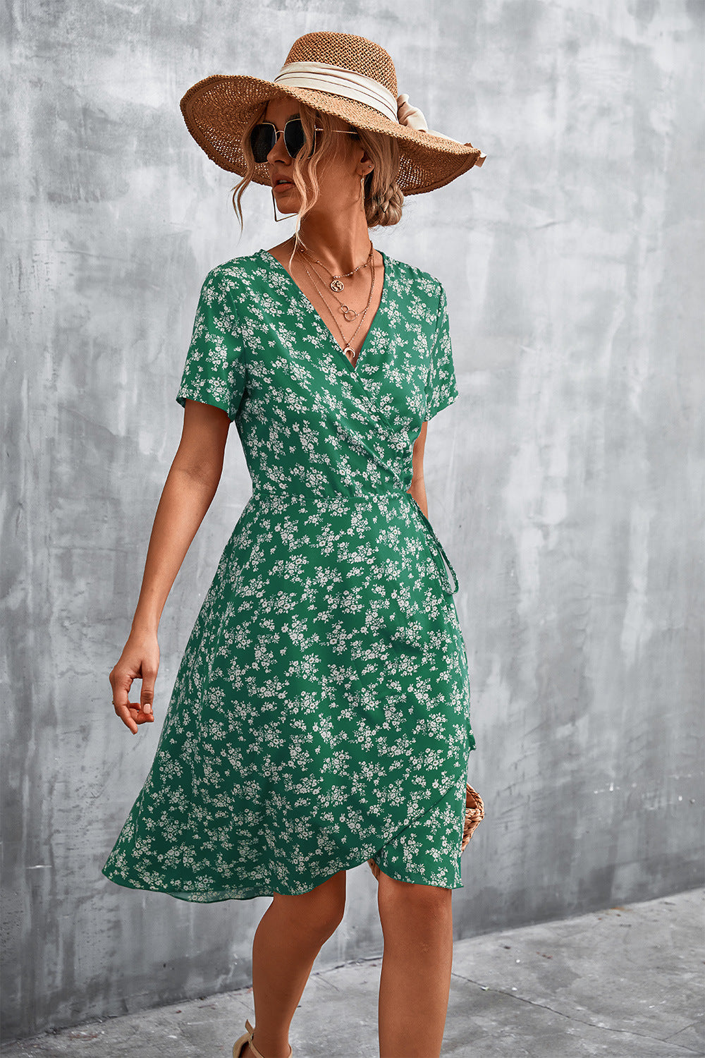 Crimson Floral Wrap Midi Dress in Light Green with short sleeves and a V-neck.