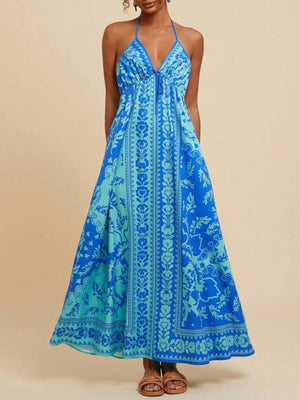 Blue floral halter maxi dress with plunging neckline and tie detail