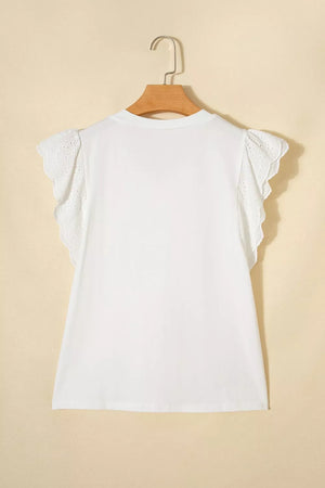 White cotton maternity t-shirt with eyelet flutter sleeves and scalloped trim.