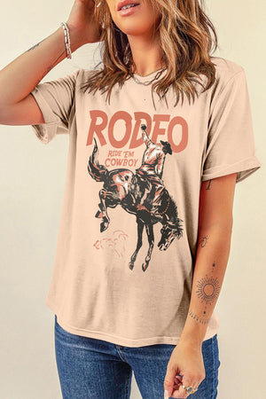 Tan rodeo graphic tee with bronco rider and text.