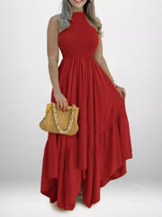 Deep red smocked halter maxi dress with ruffle hem detail.
