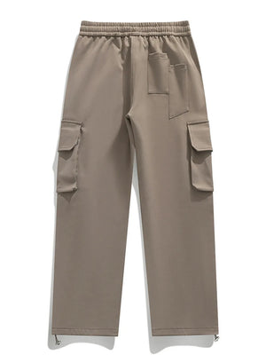 Light brown cargo pants with drawstring waist and multiple pockets.