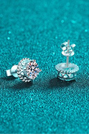 Sterling silver stud earrings with moissanite and rope-like frame detail.