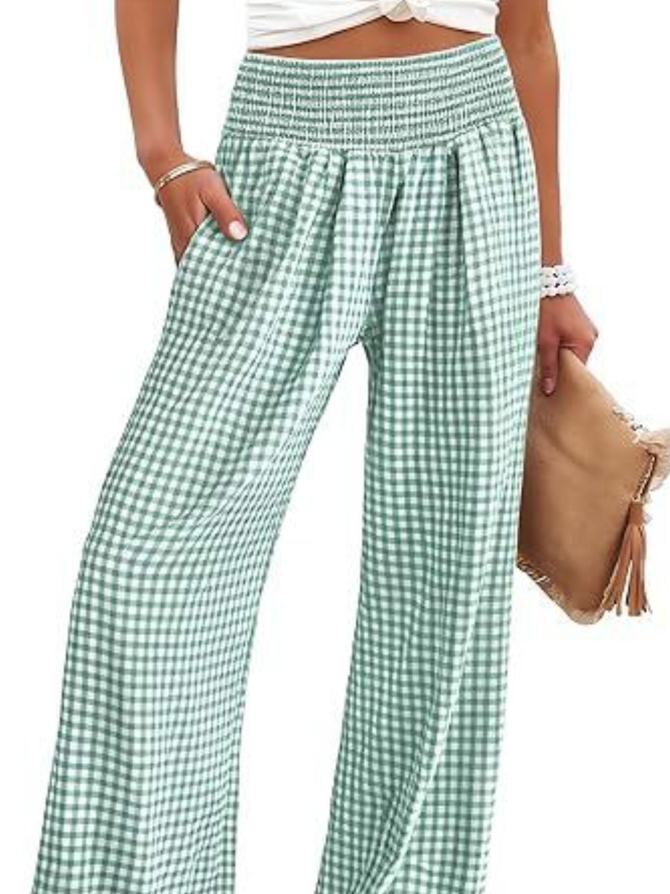 Smocked high-waist wide-leg pants in gum leaf gingham with pockets.