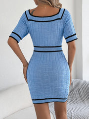 Sky blue knit bodycon dress with black contrast trim and square neckline.