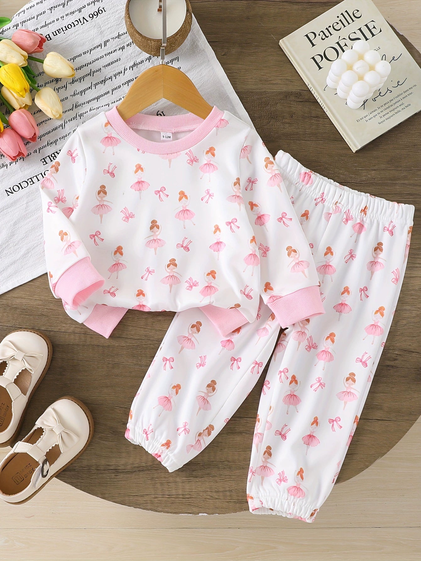 Baby girl's white long sleeve tee and pants set with pink ballerina and bow print.