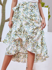 Asymmetric wrap skirt with leaf print and ruffled hem, in Gum Leaf color.