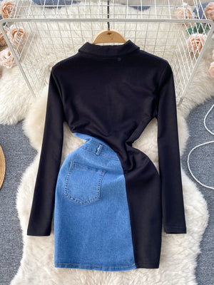 Black long sleeve asymmetrical denim patchwork mini dress with a mock neck and back pocket detail.