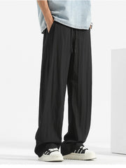 Black sweatpants with drawstring waist and wide leg, men's casual pants.