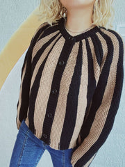 Bold stripe knit cardigan in tan and black with button front and crew neck.