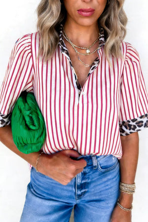 Chic striped shirt with leopard trim on collar and cuffs, short sleeves, button front.