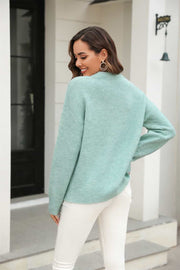 Light Green brushed-knit crewneck pullover sweater with ribbed cuffs and hem.