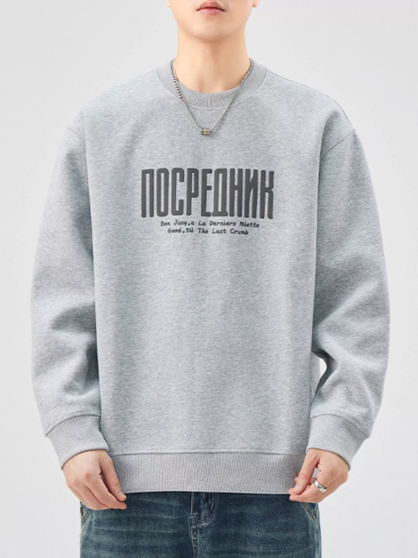 Oversized graphic sweatshirt in gray cotton blend with crewneck and ribbed cuffs.