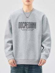 Oversized graphic sweatshirt in gray cotton blend with crewneck and ribbed cuffs.
