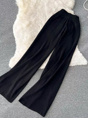 Black wide leg pants with tied waist detail