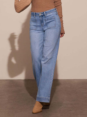 Sailor-inspired light wash denim jeans with wide legs and patch pockets.