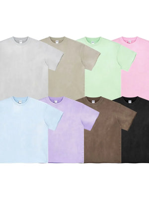 Raw edge boxy t-shirts in multiple colors: gray, taupe, light green, blush pink, light blue, lavender, khaki, black.