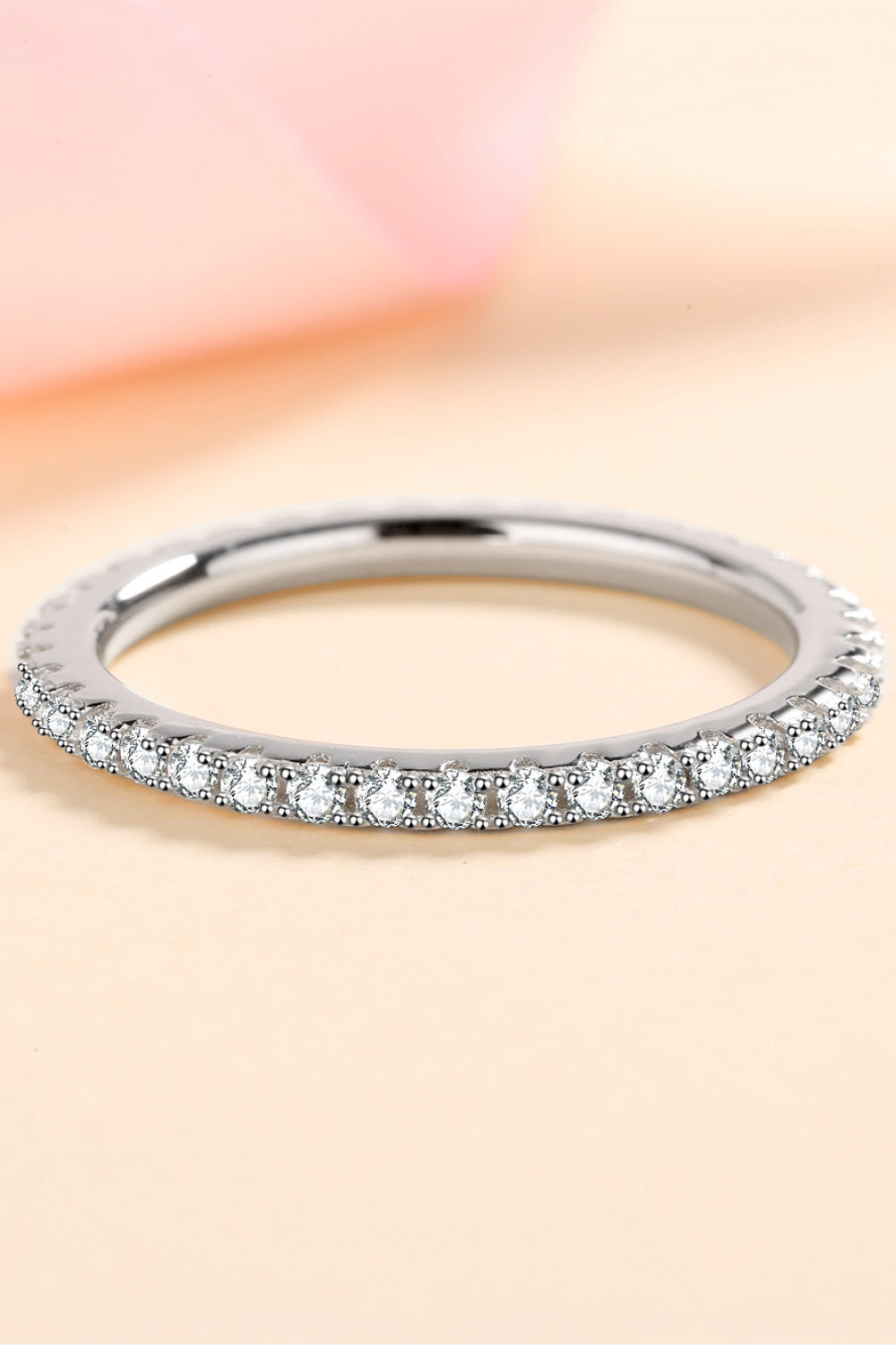 Sterling silver eternity band ring with micro-pave set clear stones