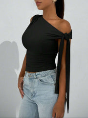 Black asymmetrical tie detail cropped blouse with one shoulder and tie sleeves.