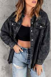 Oversized black denim shirt jacket with frayed hem and button front.