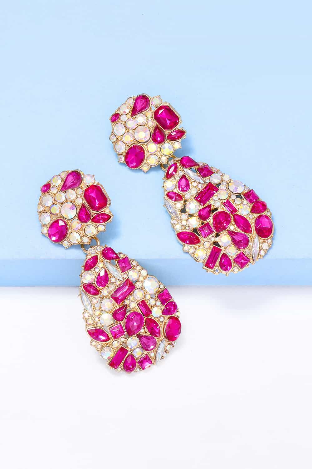 Gemstone cluster drop earrings in hot pink and clear acrylic with alloy settings.