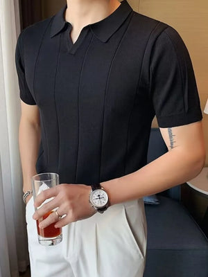 Black knit polo shirt with vertical ribbing and short sleeves.
