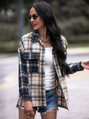 Colorblock plaid utility shacket in navy with button front and chest pockets.