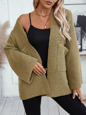 Chunky knit open front cardigan in moss with pockets and wide sleeves.