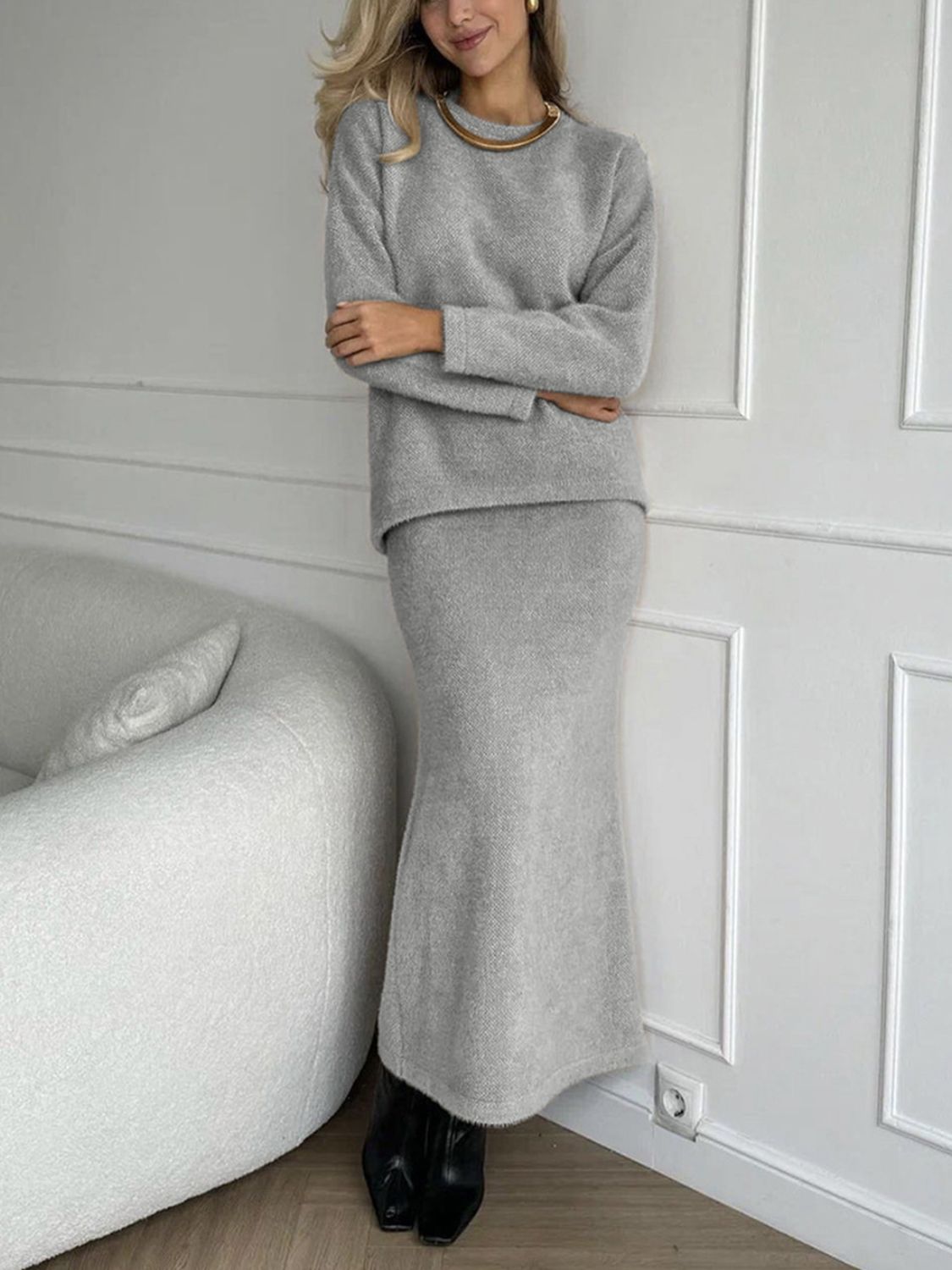 Gray textured knit co-ord set with relaxed fit sweater and maxi skirt.
