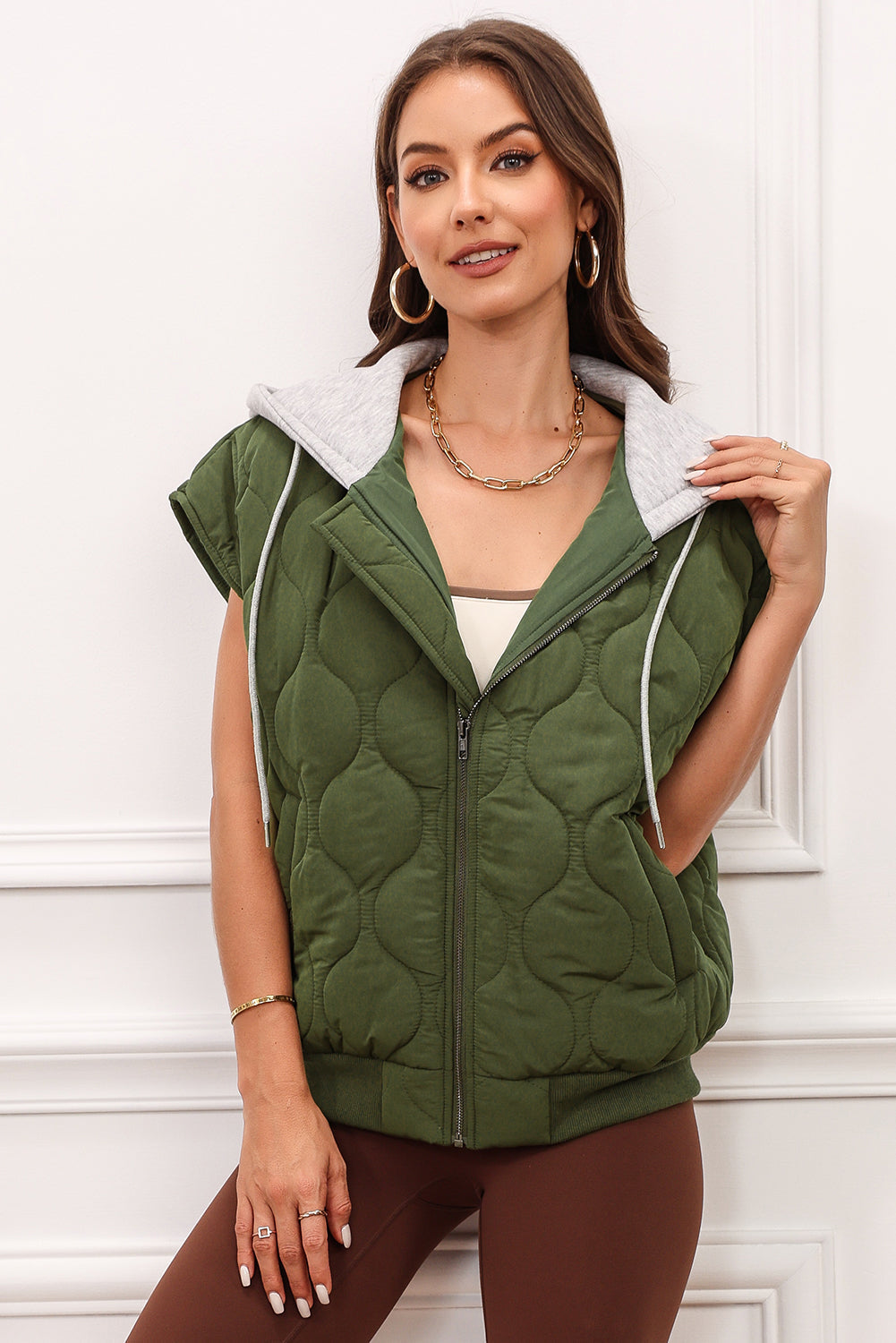 Moss quilted hooded sleeveless jacket with zipper and drawstring details