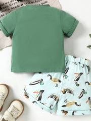 Baby green cotton blend graphic tee and duck print shorts set