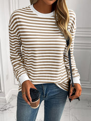 Horizontal stripe crewneck sweatshirt in mocha and white with white cuffs.