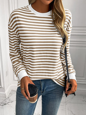 Horizontal stripe crewneck sweatshirt in mocha and white with white cuffs.