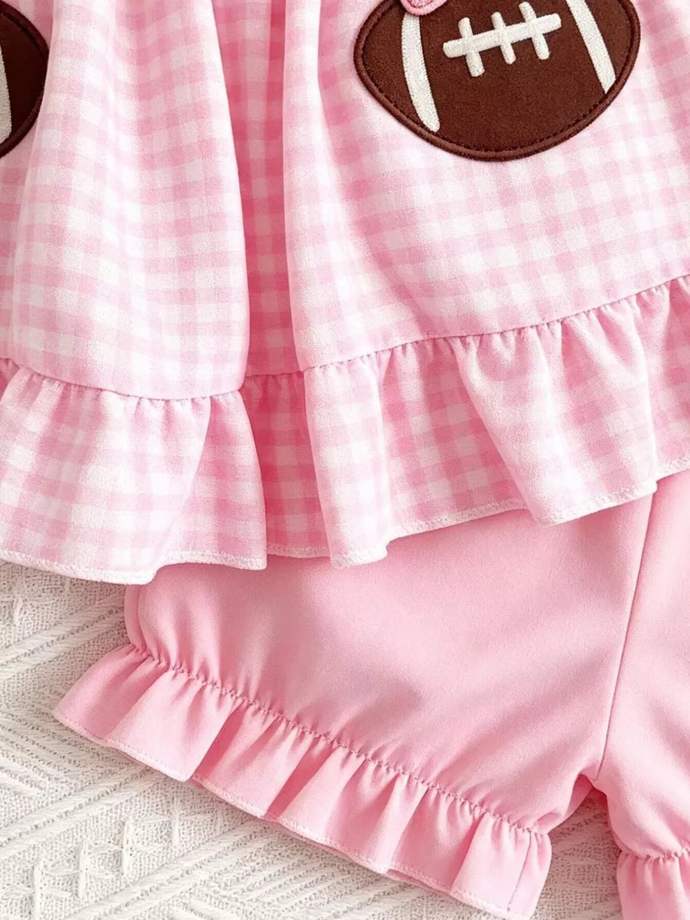 Children's Gingham Top And Shorts Set in Pink, model styling view