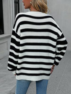 Chunky stripe relaxed fit knit sweater in black and white acrylic, crew neck, long sleeves.