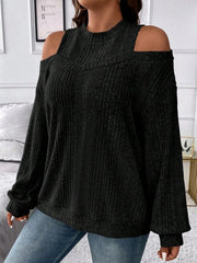 Black ribbed mock neck cold shoulder top with long sleeves.