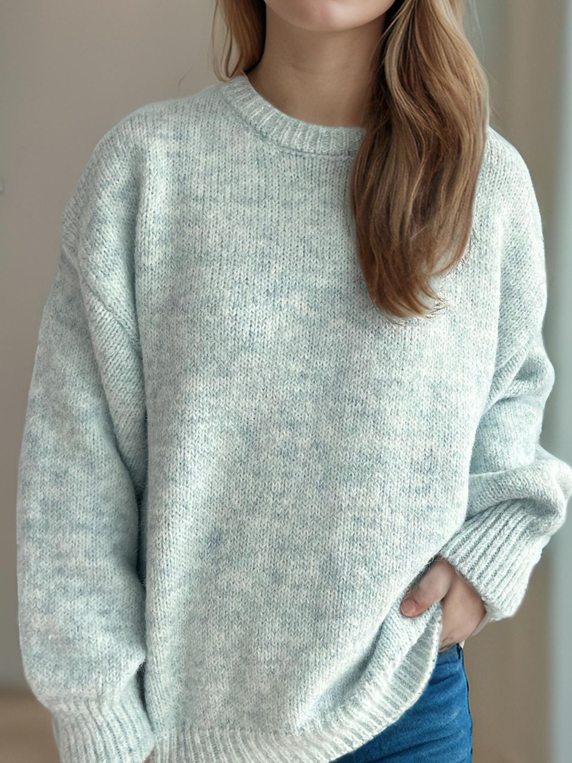 Oversized crewneck sweater in light blue marled knit with ribbed cuffs and hem