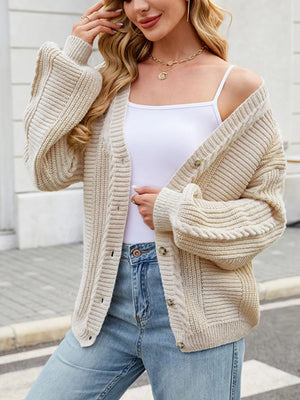 Cable Knit Button-up Cardigan in Black, model styling view