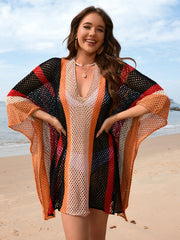 Striped mesh kimono cover-up with V-neck and wide sleeves in multi-color stripes.