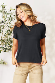 Black bamboo crew neck tee with slit hemline, short sleeves, and a relaxed fit.