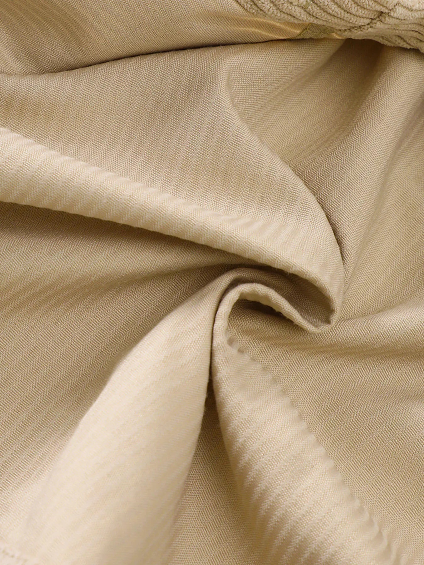 Casual tan corduroy button-up jacket fabric detail