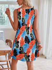 Tropical Leaf Print A-line Dress in Red Blue with sleeveless, round neck and flared hem.