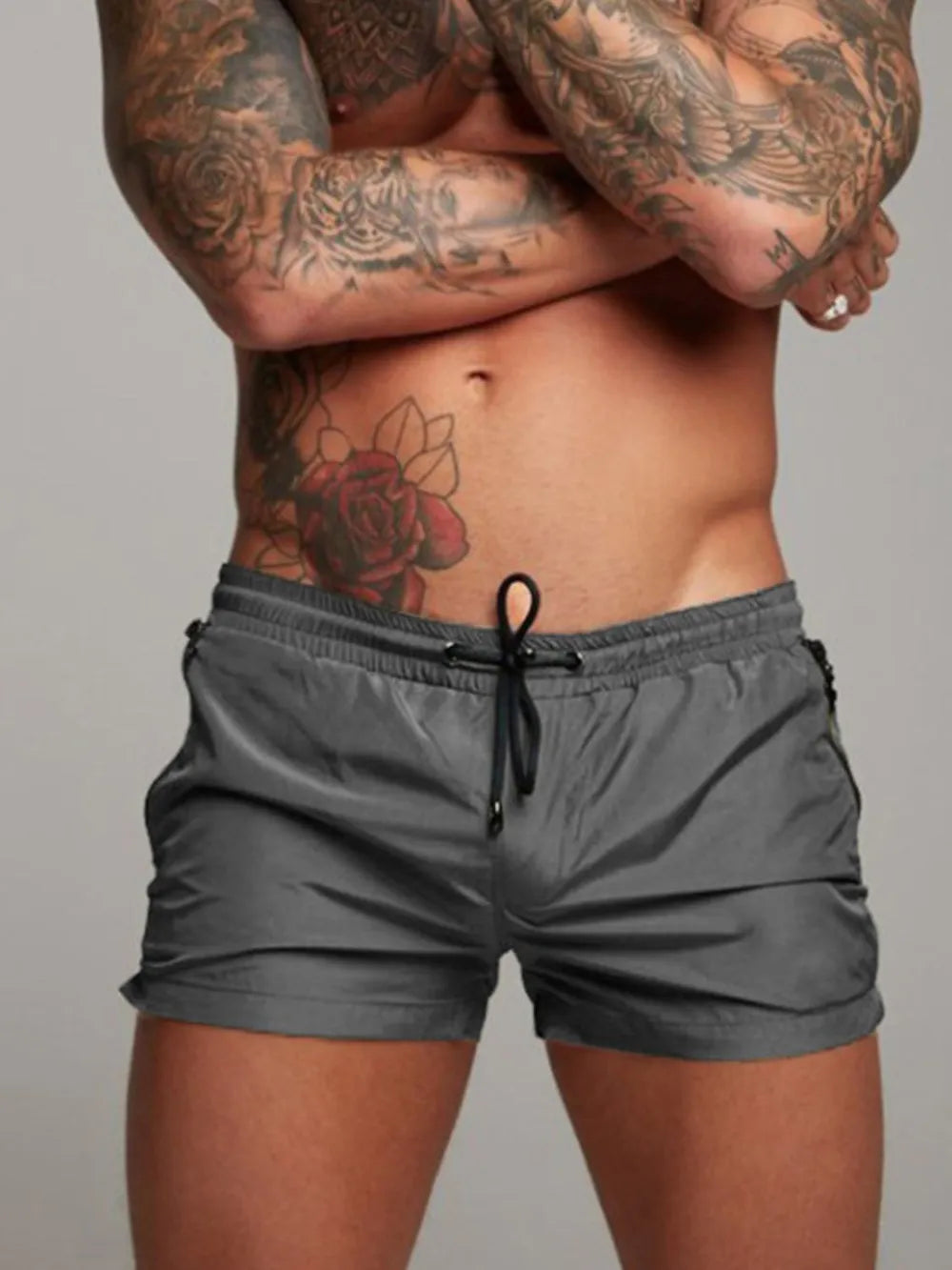 Dark Gray Coastal Zip Pocket Swim Shorts with drawstring and side zip pockets.