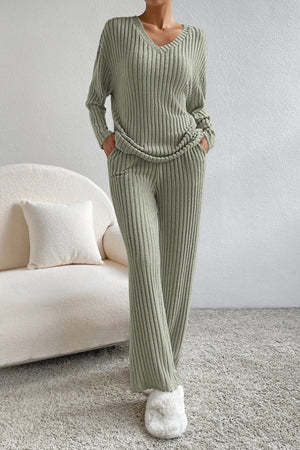 Sage ribbed knit loungewear set with v-neck sweater and wide-leg pants.