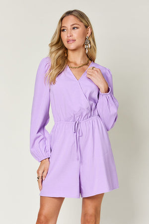 Lavender wrap front romper with puff sleeves and adjustable drawstring waist