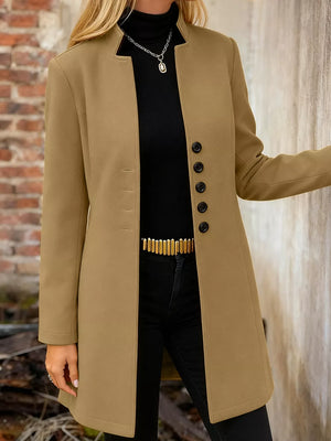 Khaki longline trench coat with button-down front and collarless neckline.