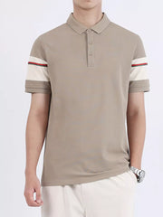 Desert color combed cotton polo with striped sleeve accents